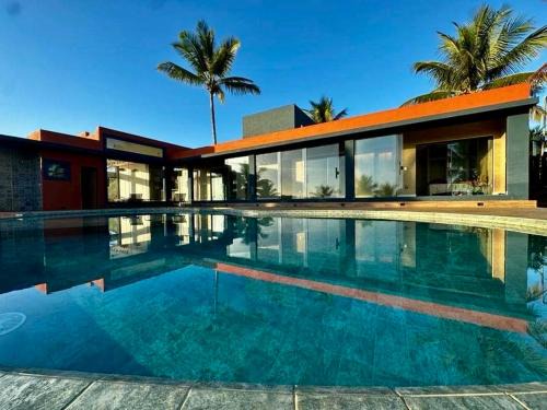 Itacare Bed & Breakfast | La Maison Loosaï -Σlégance com TV