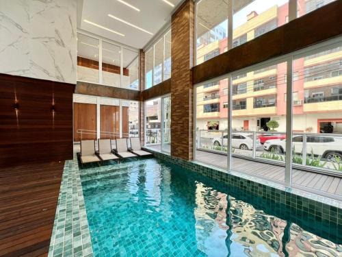 Capao da Canoa Apartment | Lindo Apartamento novo 2 quartos Completo - Piscina Aquecida e apenas 3 quadras da praia