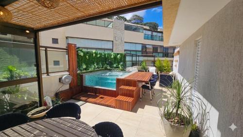 Itaipava Apartment | Loft Itaipava All Suítes com Piscina Privativa Aquecida