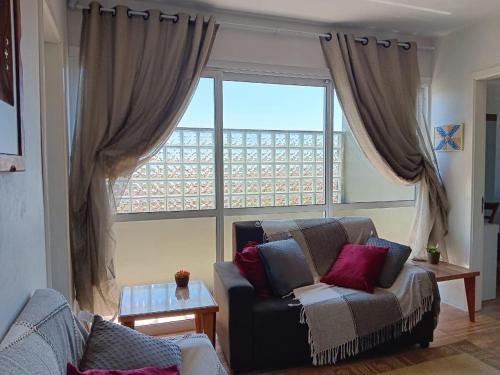 Passo de Torres Apartment | Morada 2 andares próximo ao mar com estacionamento e Wi-Fi