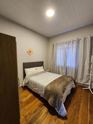 Matriz Other | Pequeno quarto no coração de Curitiba
