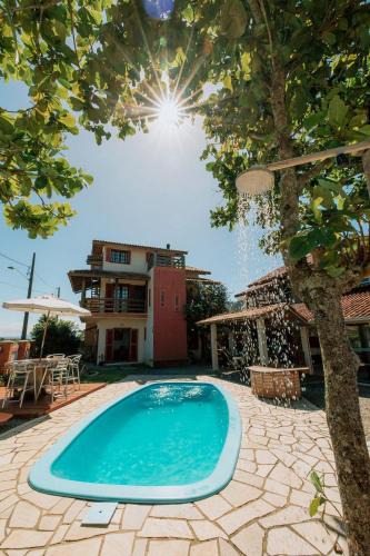 Praia Grande Hotel | Pousada Casa Aratuca - 200mt da praia