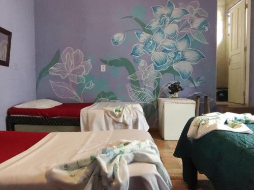 Pontal Hotel | Pousada Dádiva Encanto da Orquídea a passos da praia do Pontal c ar e frigobar