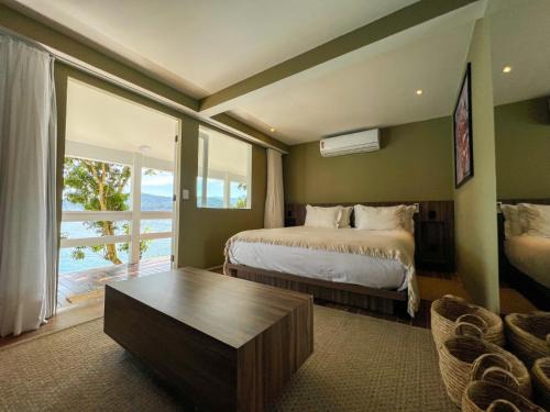Ilha Grande Hotel | Pousada Papiro Boutique