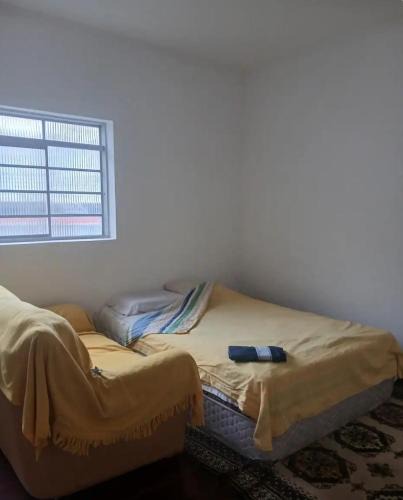 Regiao Urbana Homogenea X House | Quarto Aconchegante no Centro de Poços de Caldas - Pousada do Chico