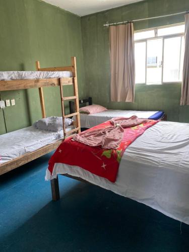 Sete Lagoas Hostel | Quarto econômico central