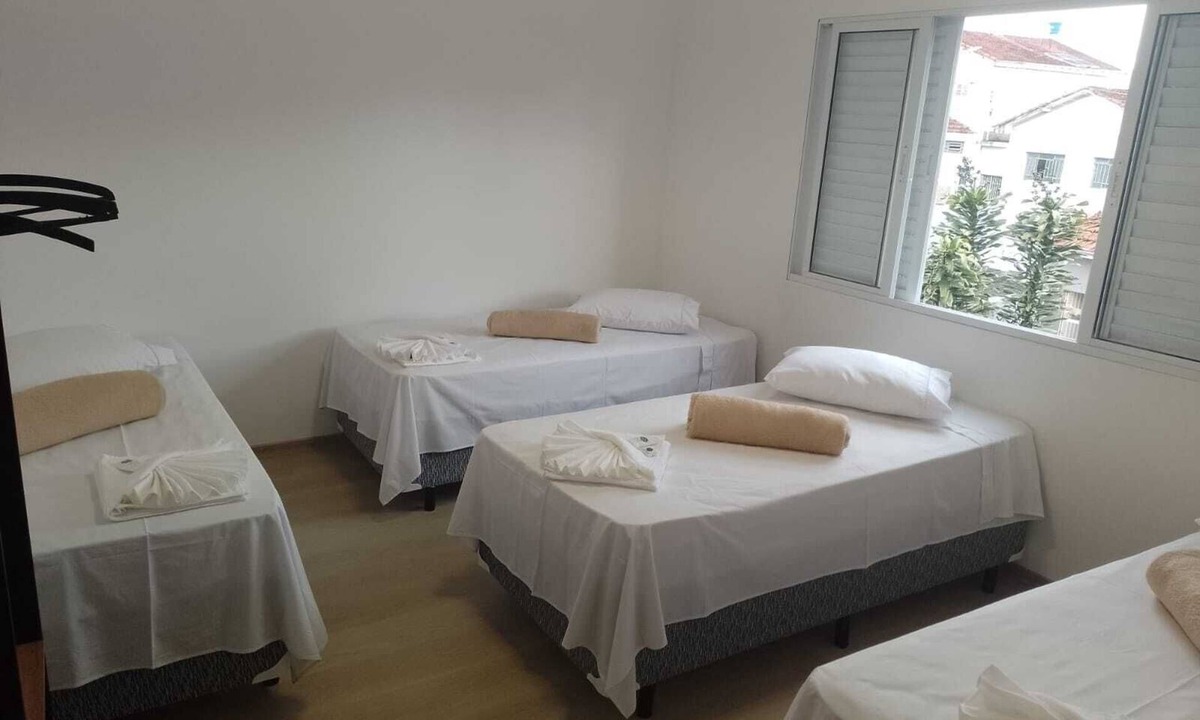 Paraisopolis Apartment | Quarto Família Superior na Pousada Verissimus