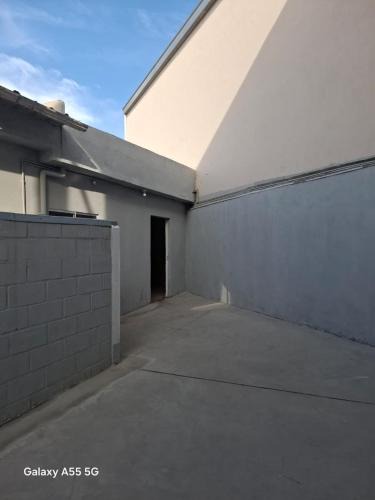 Nacional 1a Secao House | Quarto Privativo Premium 01