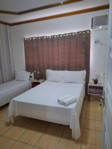 Alvorada House | Quarto triplo com banheiro em Pousada e Restaurante