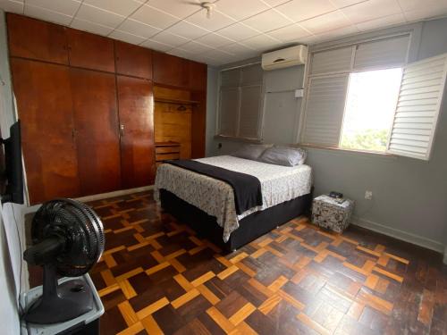 Nazare House | Quartos confortáveis em apartamento prox pç da República