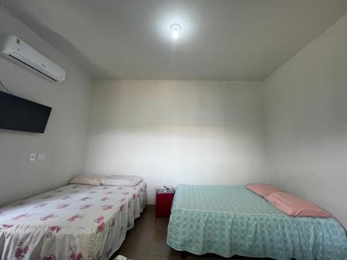 Plano Diretor Sul House | Residencial Jasmim quarto Standard 01