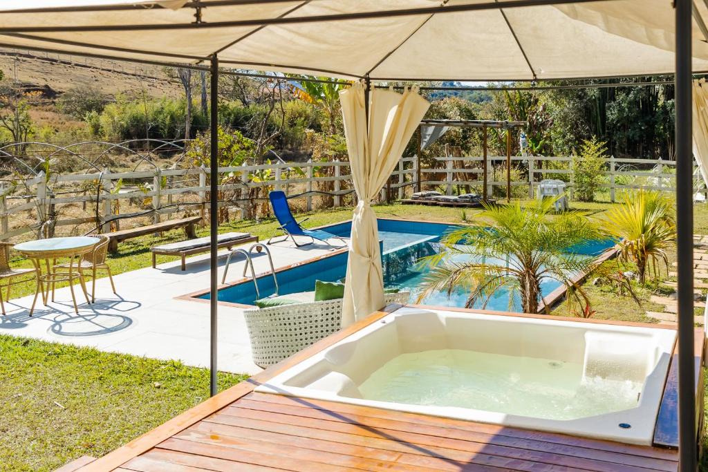 Piranguinho House | Sítio com SPA, lareira e piscina - Piranguinho, MG
