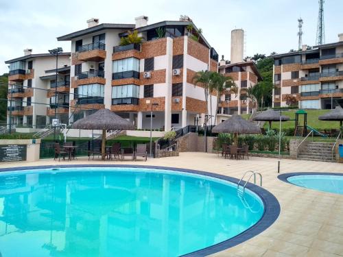 Florianopolis Apartment | Segurança e conforto na Praia Brava a 100 do mar - Condomínio Curimã