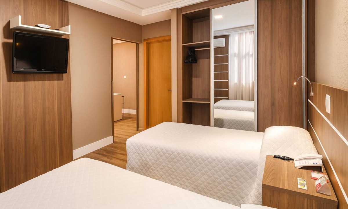 Civic Center Hotel | Spacious Master Triple Twin Suite Offering Comfort, Style & Group Energy