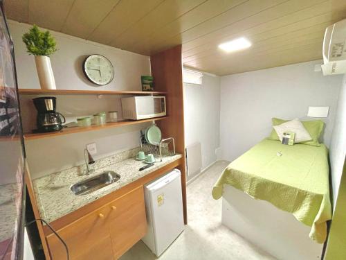 Macae House | STUDIO aconchego, com Ar, Wifi, Smartv e Cozinha