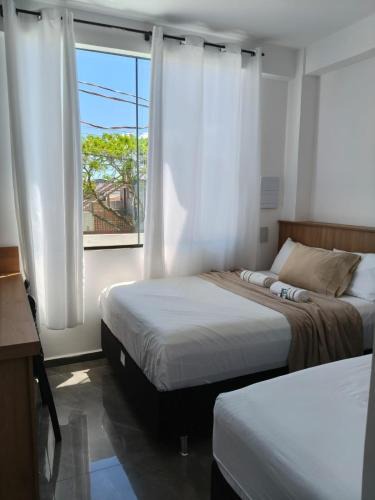 Praia de Leste Hotel | suíte 17 tripla praia de leste