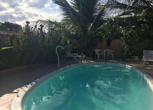 Bairro da Enseada House | Suíte 2 com piscina e wi-fi em Caraguatatuba