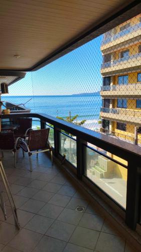 Itapema House | Suíte com varanda frente mar
