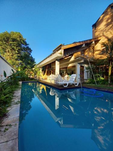 Itamambuca House | Suíte no Condomínio Itamambuca - Muito Perto da Praia !