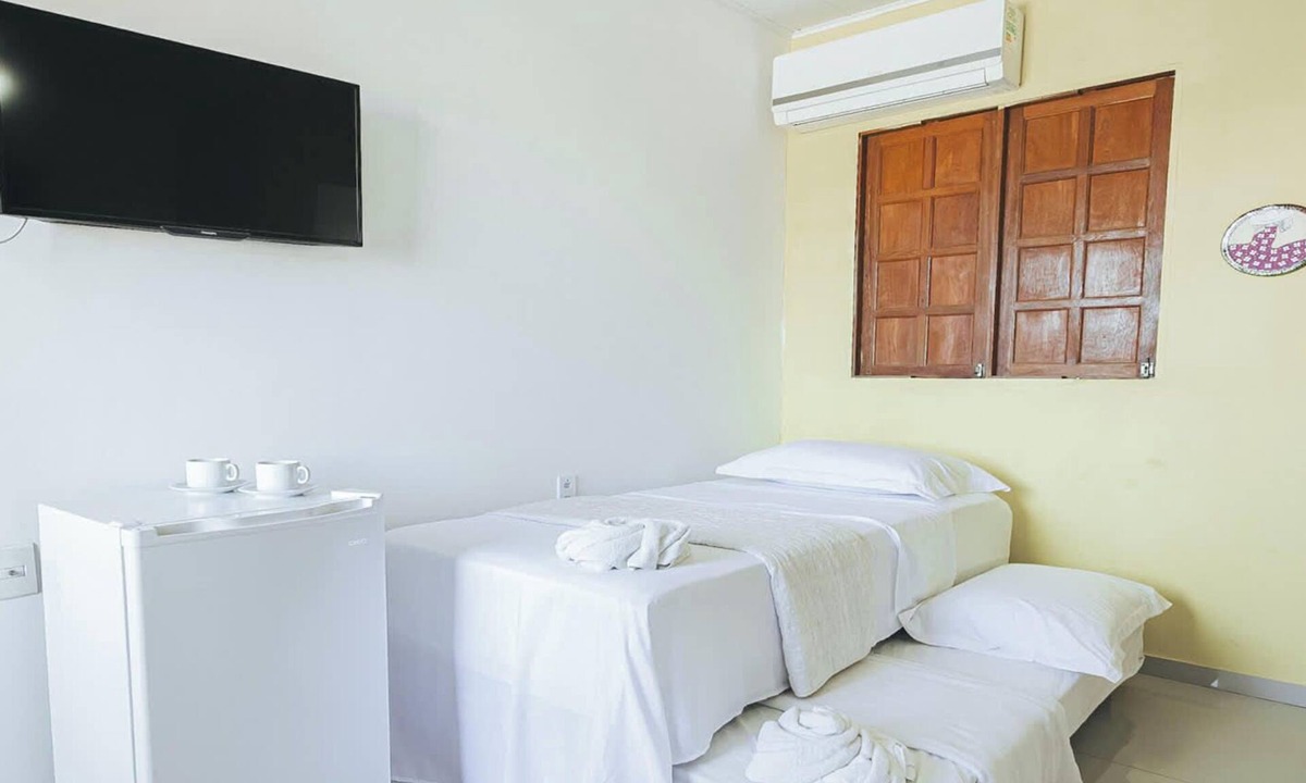Mariricu House | Suite em Guriri Norte com Piscina e Academia