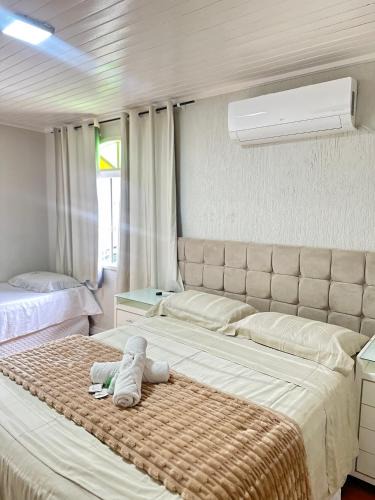 Bela Vista House | Suite em Hospedagem 100m da BR!