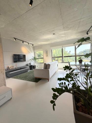 Itajai Apartment | The Green Hill Apartamento na Praia Brava com Piscinas Playground e Academia