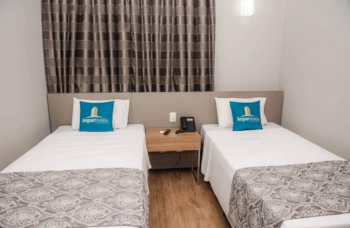 Calafate Hotel | Ímpar Suítes Expominas
