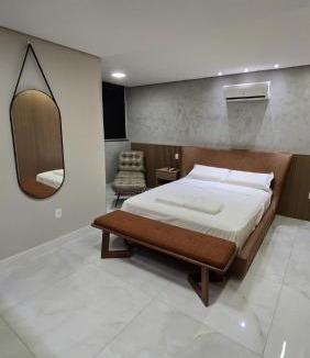 Castelo Apartment | 101 - Área Privativa de Luxo ar condicionado e churrasqueira