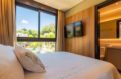 Gramado City Centre Apartment | 2 suites in downtown with hotel infrastructure.