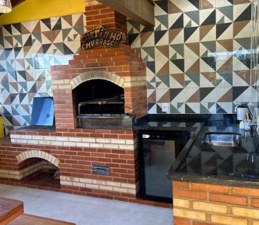 Praia de Capuaba House | 50 metros da praia,Ar condicionado na sala de estar e suíte, Área Gourmet
