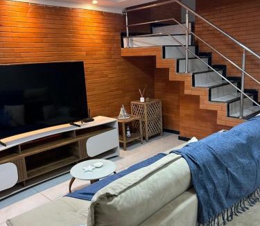 Praia de Capuaba House | 50 metros da praia,Ar condicionado na sala de estar e suíte, Área Gourmet