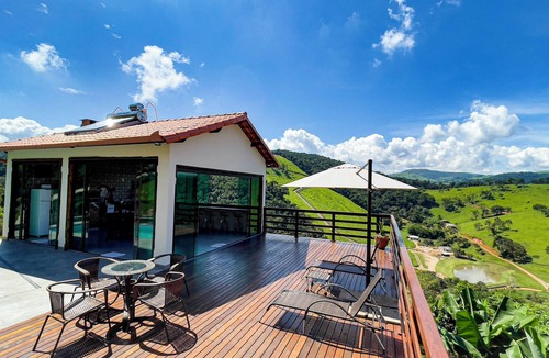 Moeda House | A Lapinha do Sertão é uma casa de hospedagem temporária, com vista panorâmica.