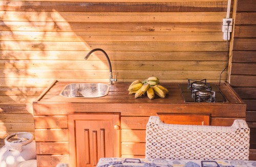 Mampituba House | A property with a cabin and birdsong.