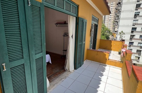 Laranjeiras House | A suíte in fabulous Laranjeiras Rio de Janeiro with Huge Balcony and Mountain