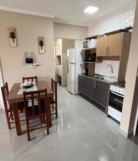 Arroio Teixeira Apartment | Aconchegante apartamento 2 dormitórios, sendo uma suíte, com piscina