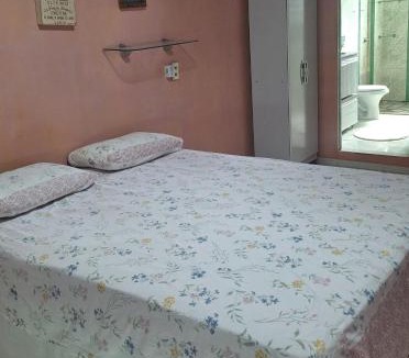 Cremacao House | Aconchego da Marci Grande quarto confortável