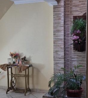 Cremacao House | Aconchego da Marci Grande quarto confortável
