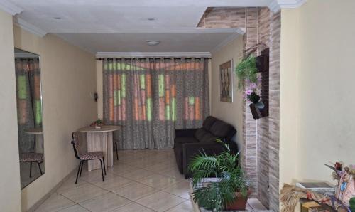 Cremacao House | Aconchego da Marci Grande quarto confortável