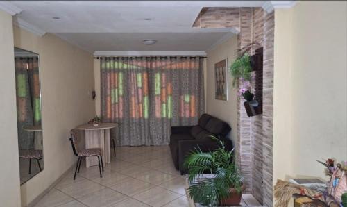 Cremacao House | Aconchego da Marci Quarto com varanda