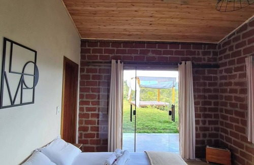 Santana do Riacho House | Adorable bungalow with fireplace and mountain views!