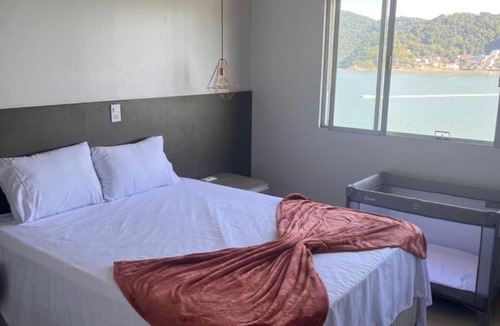 Sao Vicente Apartment | AP pé na areia com a melhor vista de São Vicente!