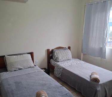 Santo Angelo Apartment | Apart próximo a Unimed, Catedral e HSA com 2 quartos com 2 ARES e garagem