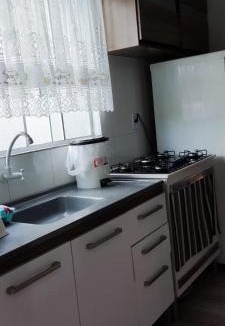 Sorriso Apartment | Apart quarto com ar condicionado, sala e cozinha