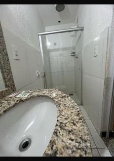 Patos de Minas Apartment | Apartamento 113 - Suíte com ar condicionado