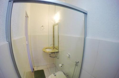 Patos de Minas Apartment | Apartamento 113 - Suíte com ar condicionado