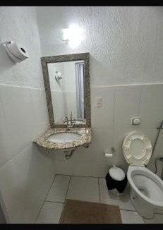 Patos de Minas Apartment | Apartamento 113 - Suíte com ar condicionado