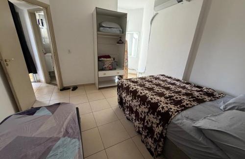 Sao Vicente Apartment | Apartamento centro de Sv, garagem, ar, elevador à 1 quadra da praia