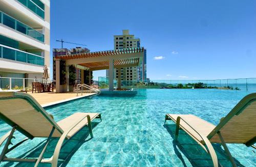 Itacolomi Apartment | Apartamento em Condomínio Frente-Mar com Piscinas, Jacuzzi Aquecida, Sauna, Academia, Brinquedoteca, Churrasqueira na Sacada, Cozinha Completa e Lazer de Home Club