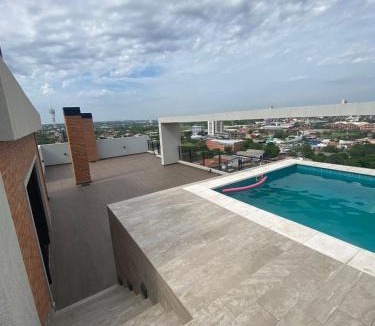 Luque Apartment | Apartamento en edificio nuevo con wifi y piscina