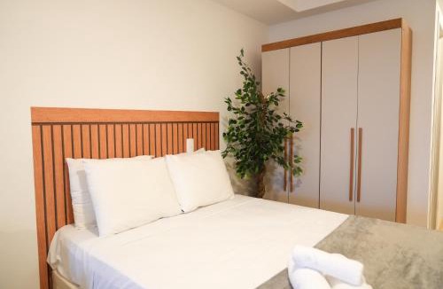 Porto Maravilha Apartment | Apartamento para 4 pessoas na frente do metrô e com piscina no Rooftop